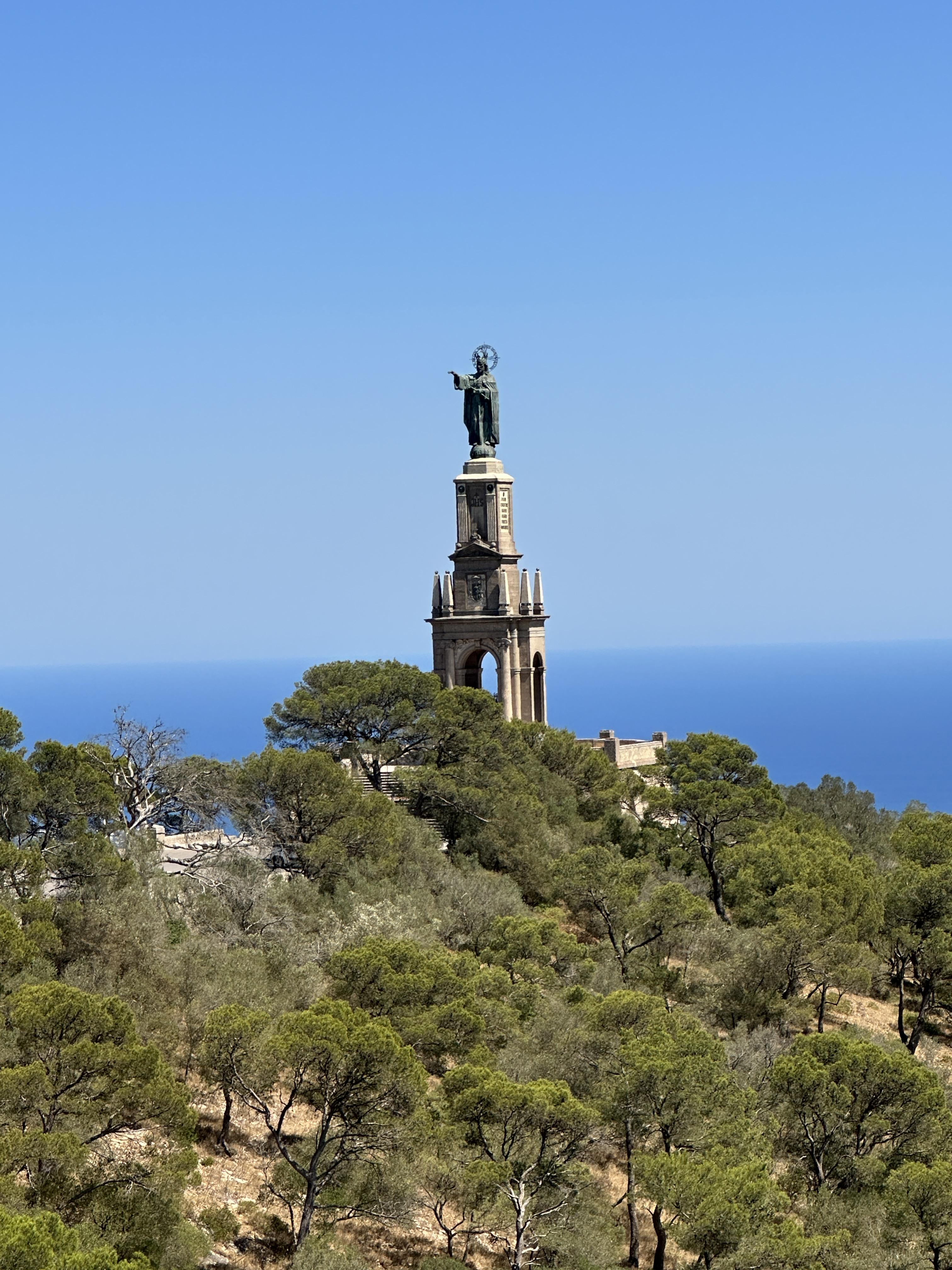 Christ the King monument at Sant Salvador overlooking the Mediterranean Sea.