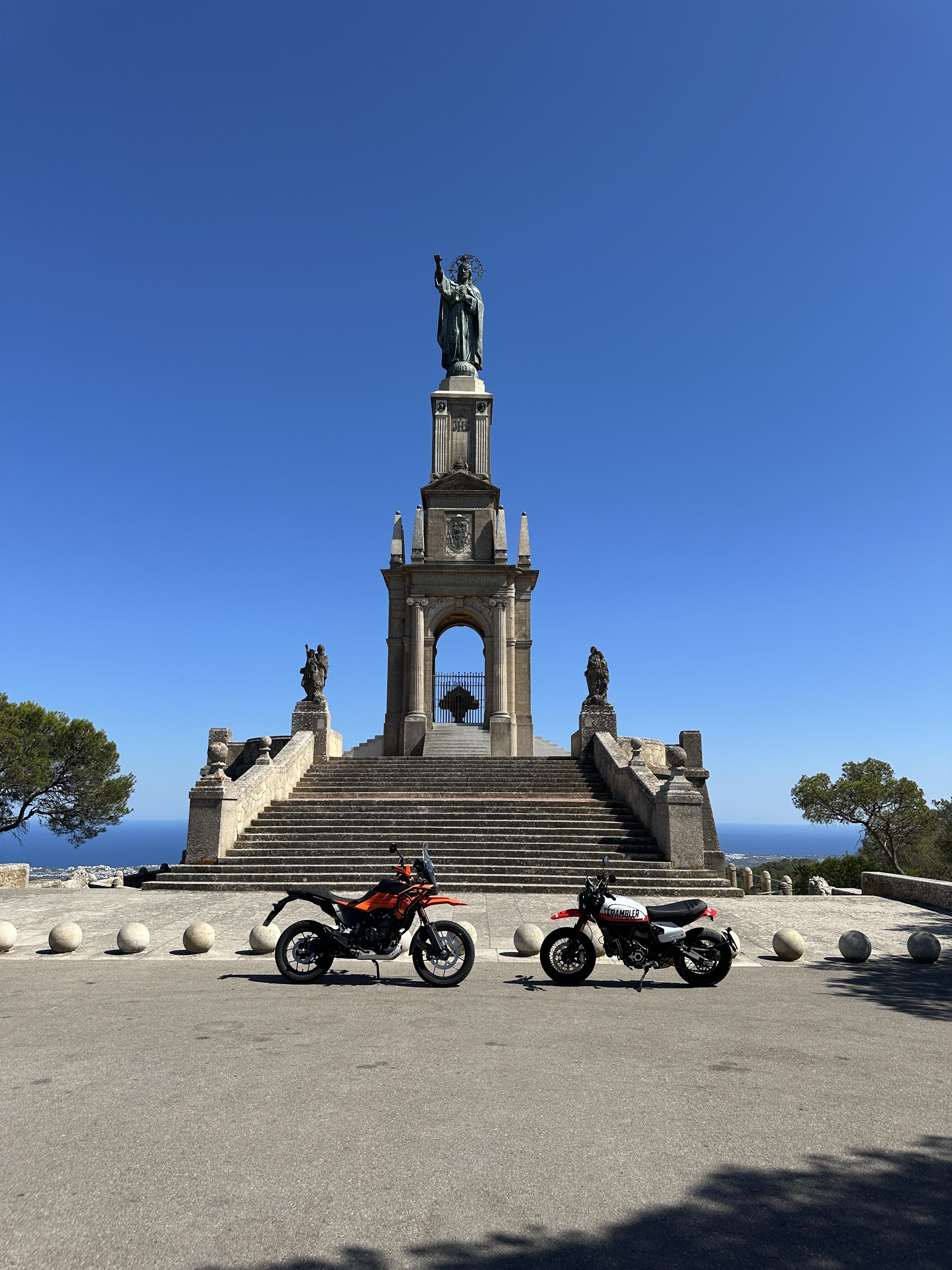 Ducati Scrambler and KTM Adventure at Sant Salvador during a motorcycle tour in Mallorca.