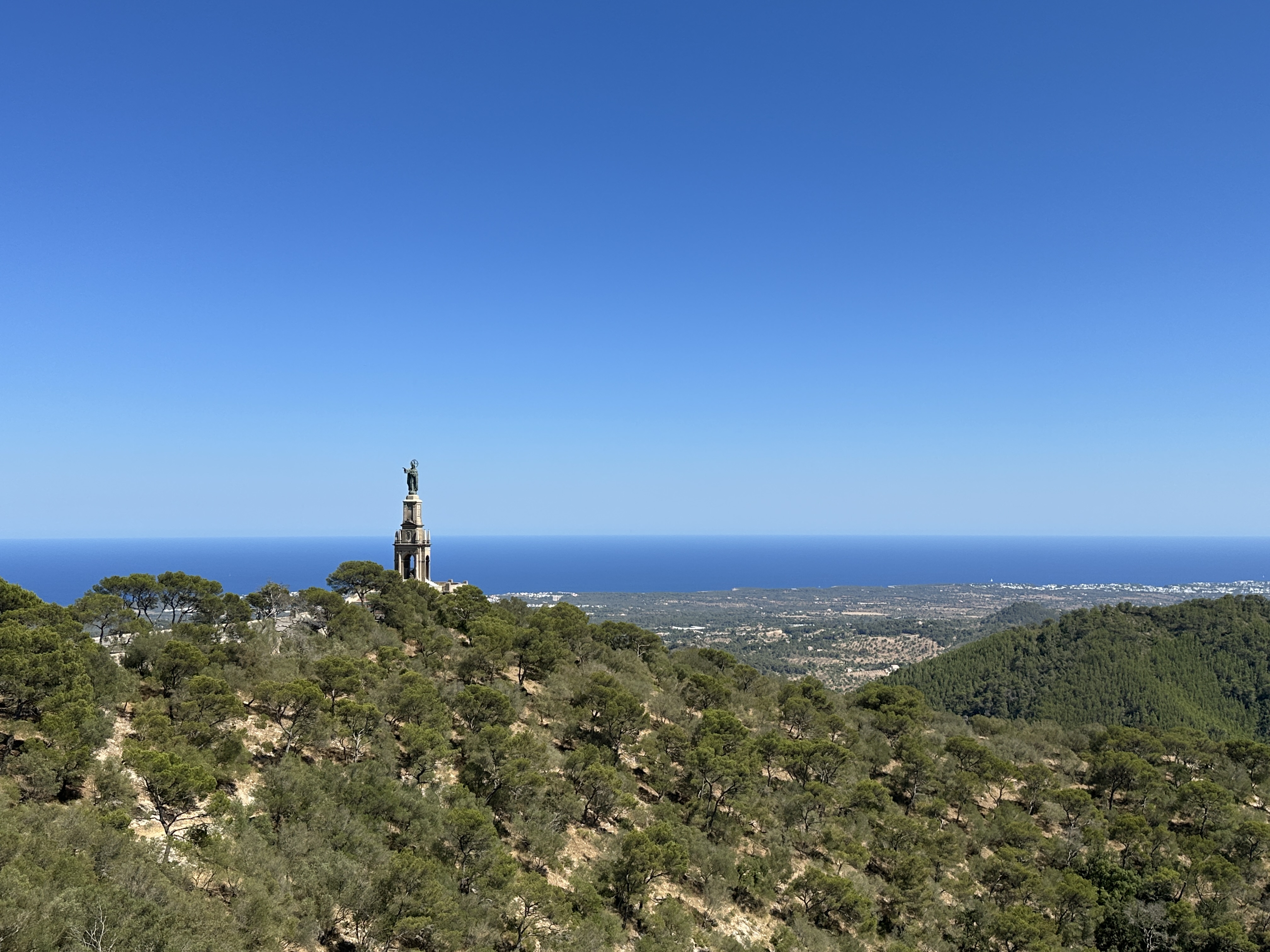 Christ the King monument near Sant Salvador Sanctuary overlooking the Mallorca coastline.